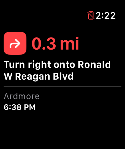 Apple Watch turn card in red: turn right onto Ronald W Reagan Blvd in 0.3 miles